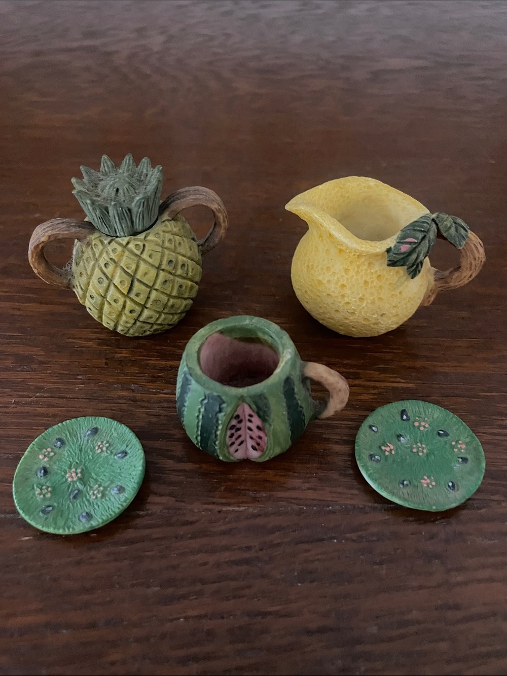 Miniature dishes set with fruit design